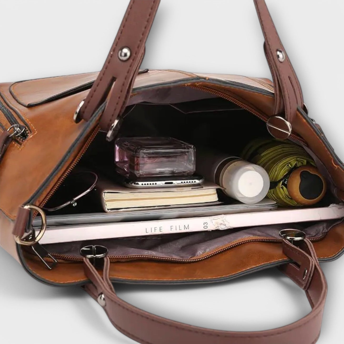 Nora. - Elegante Lederhandtasche