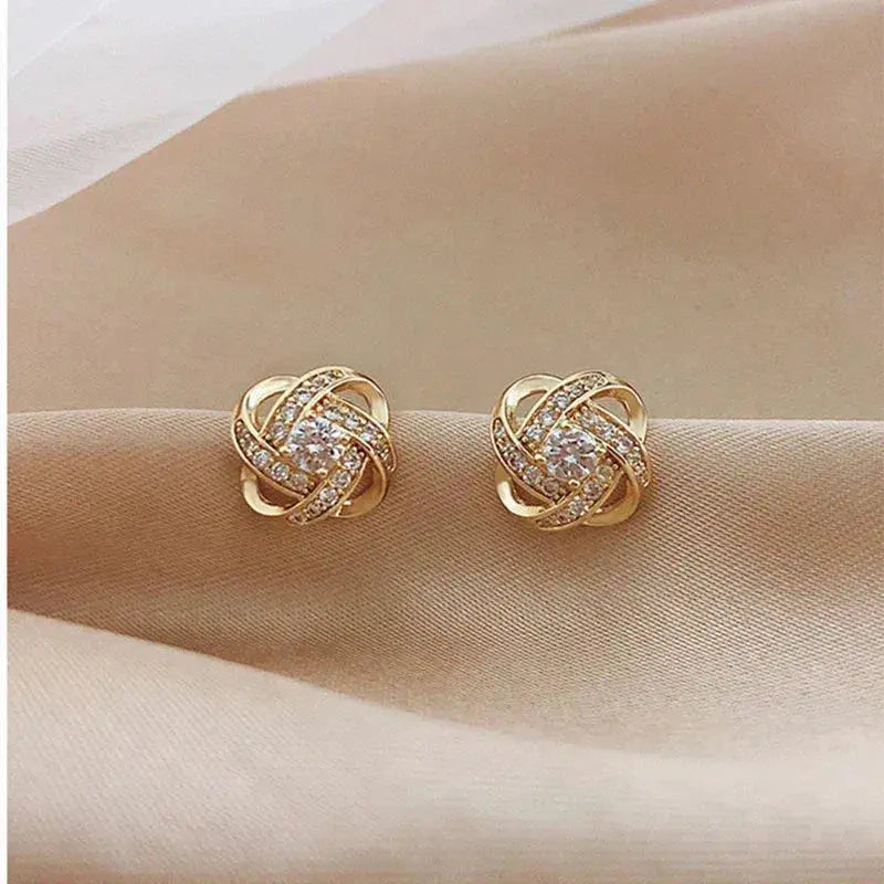 Goldene Spiralblumen Kristall Ohrstecker