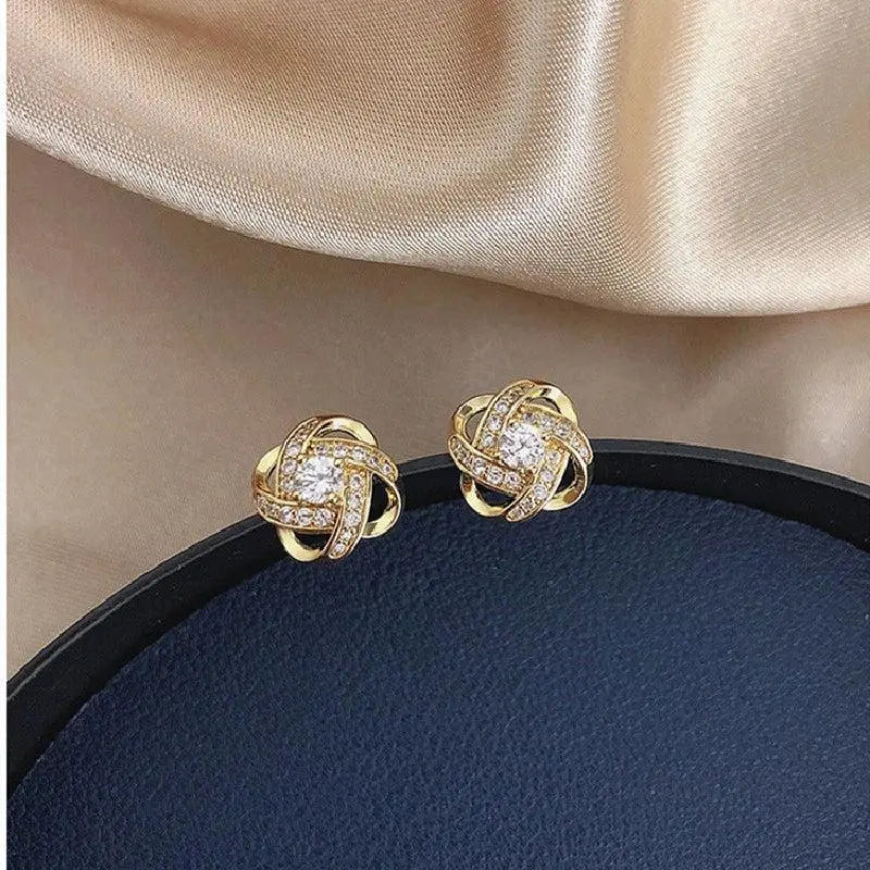 Goldene Spiralblumen Kristall Ohrstecker