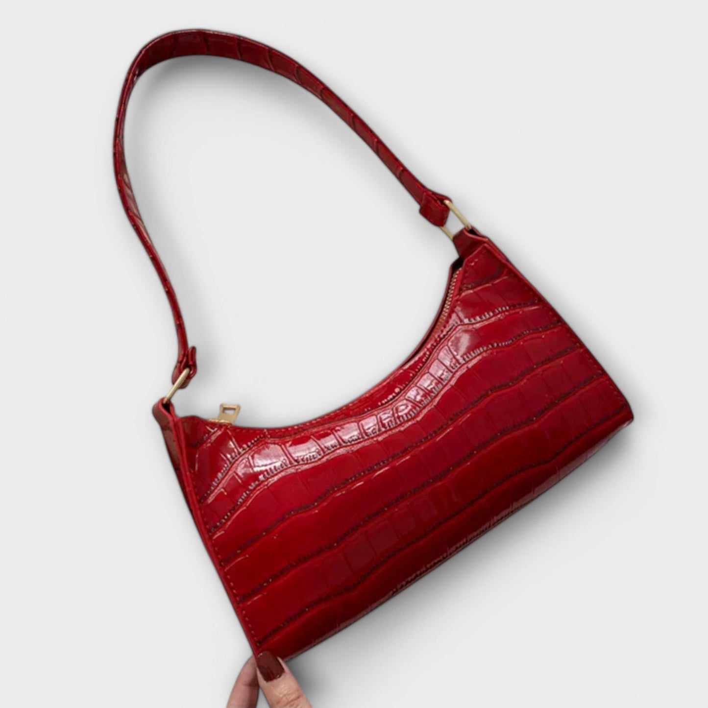 Nora. Glänzende Lederhandtasche