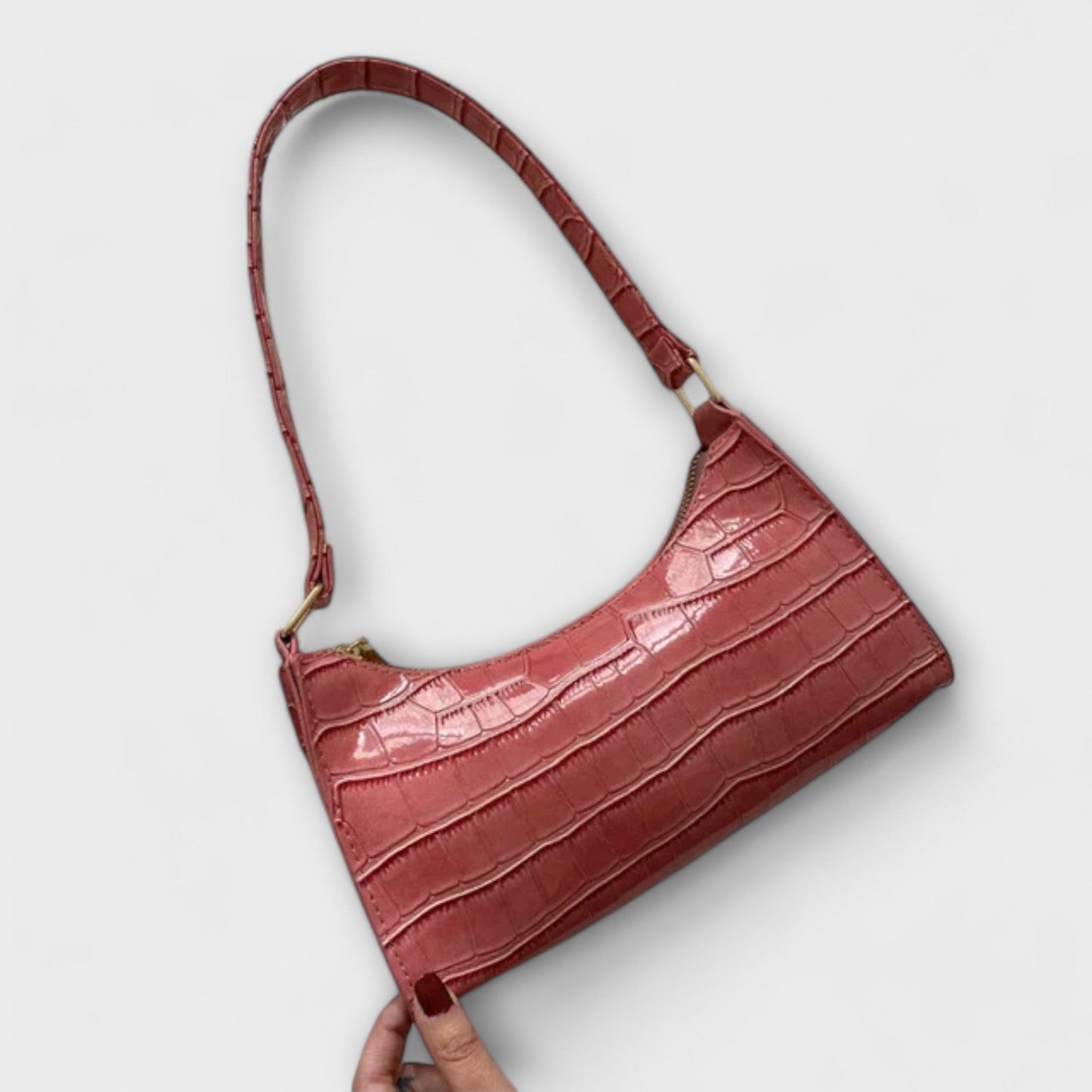Nora. Glänzende Lederhandtasche